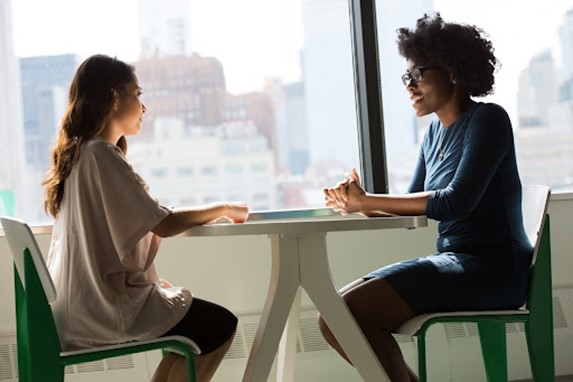 Two employees in discussion